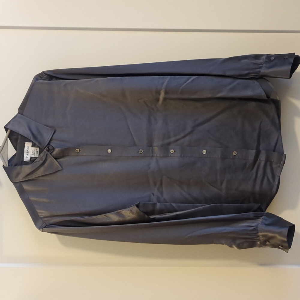Woman's Calvin Klein charcoal gray silk button down blouse. Size 12 Real silk
